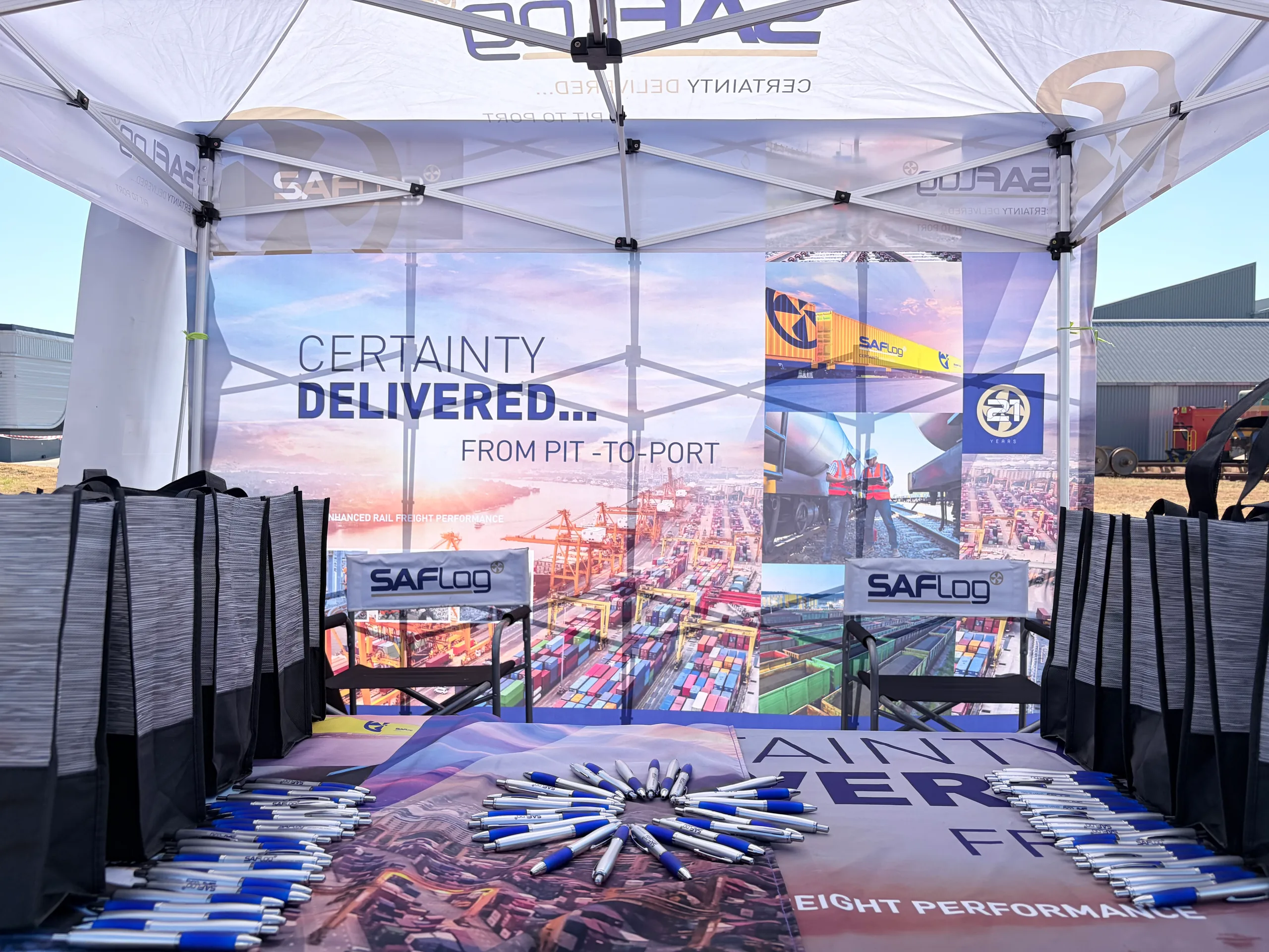 A SAFLog exhibition gazebo and branded display.
